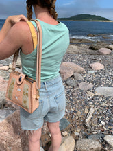 Load image into Gallery viewer, Convertible Tern Purse with Mussel Shell and Fish Leather
